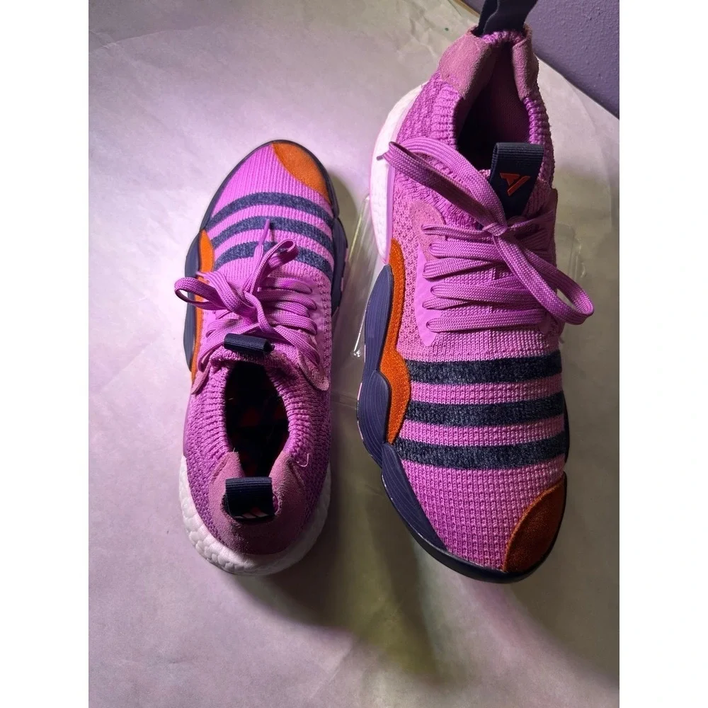 Adidas brand sports sneakers excellent condition purple color with navy blueo